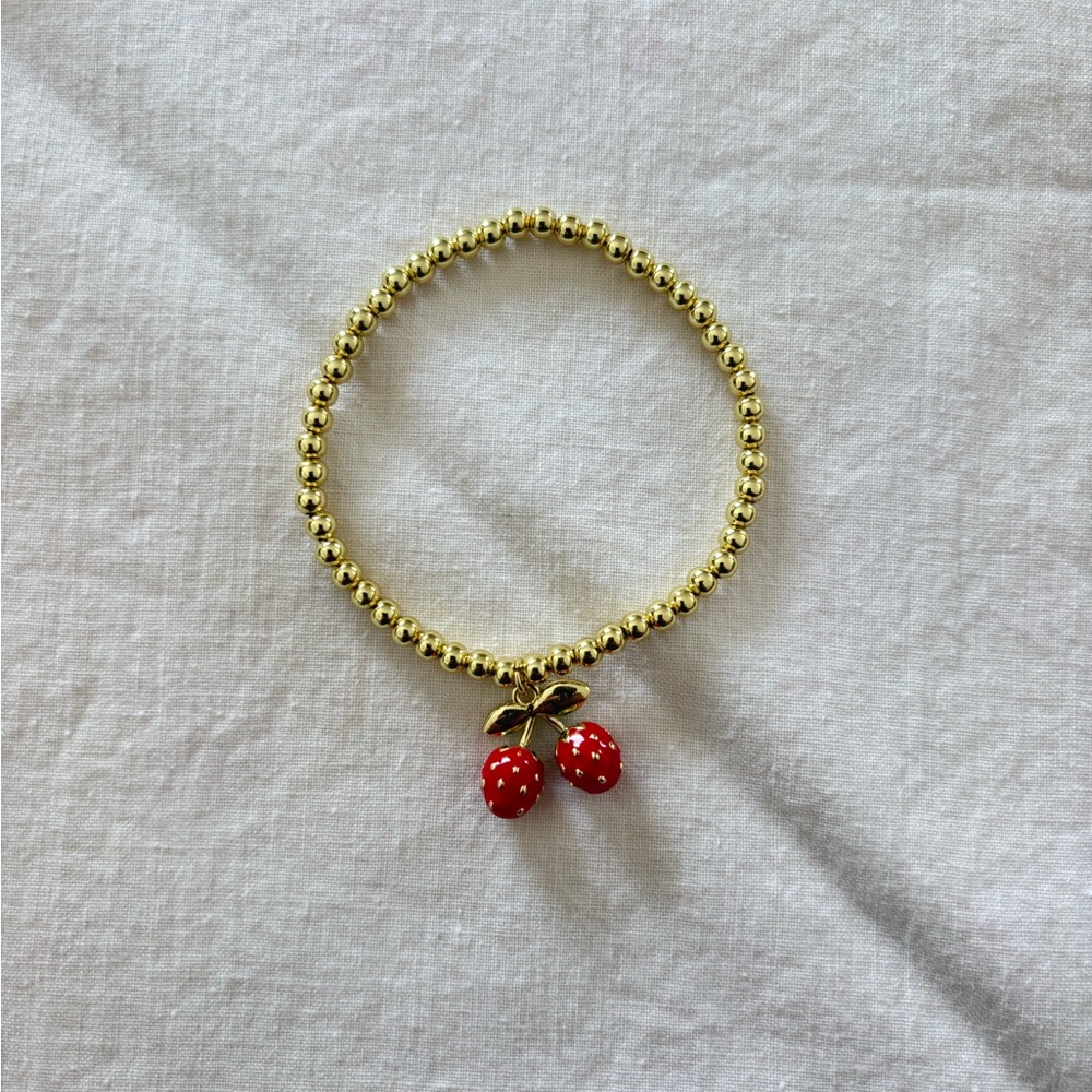 Free People Gold Beaded Bracelet with Red Cherry Charm